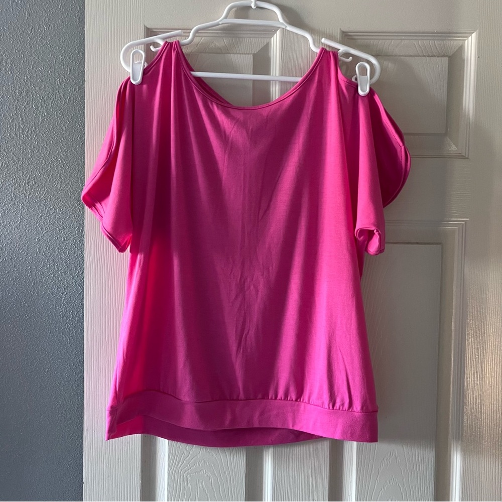 Cold shoulder pink top w/ tye in back.
